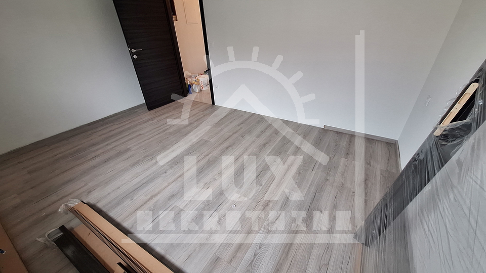 Renovated apartment in a house, two bedrooms, Zadar, Borik