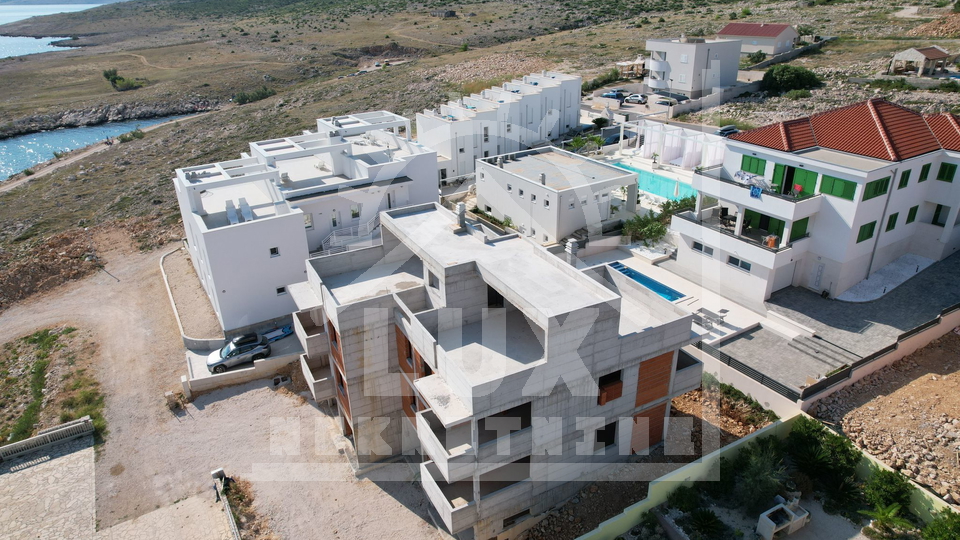 Zweizimmerwohnung mit Garten in NOVOGRADNJA, Ražanac, 60 Meter vom Meer entfernt