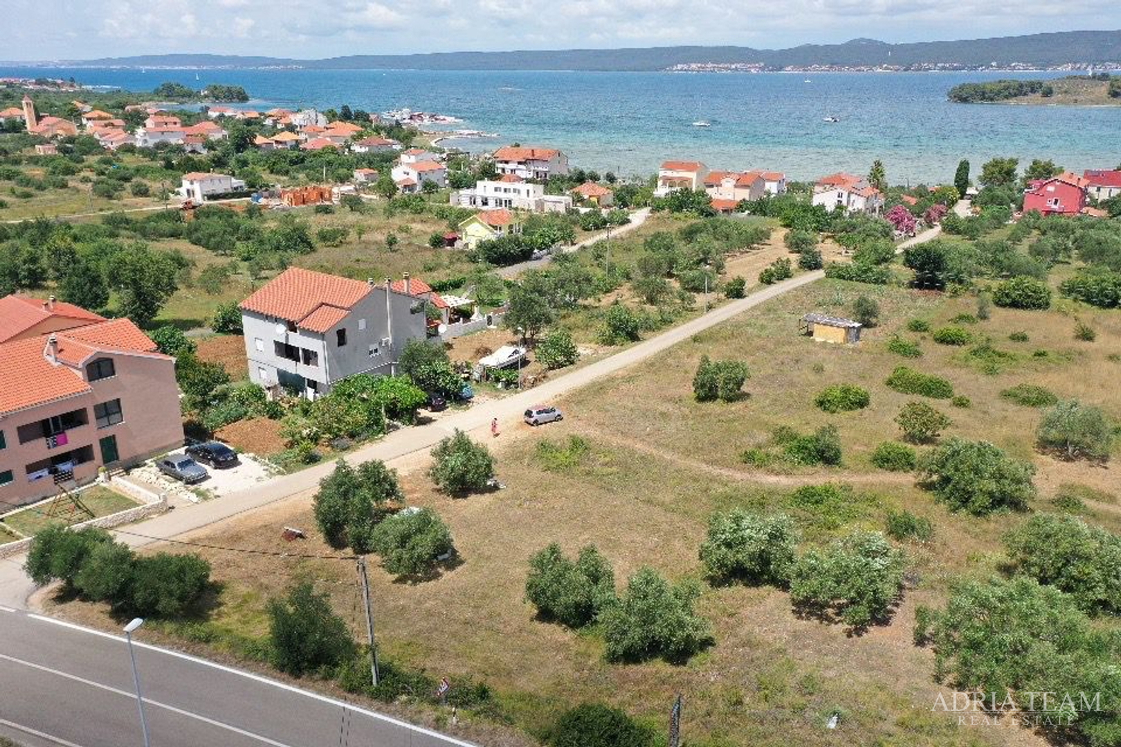GRAĐEVINSKO ZEMLJIŠTE S POGLEDOM NA MORE, 200 m OD MORA, MRLJANE - PAŠMAN