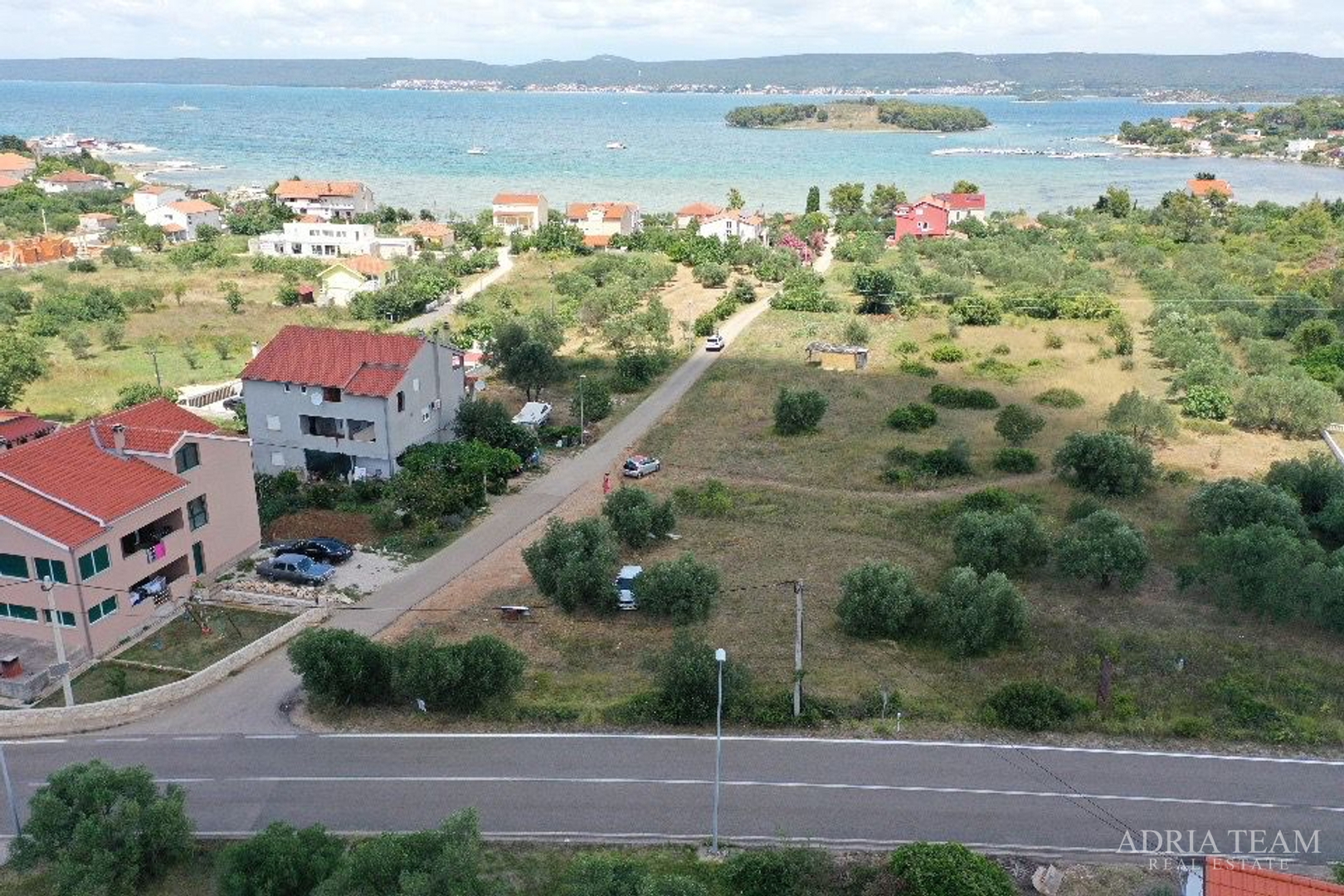 GRAĐEVINSKO ZEMLJIŠTE S POGLEDOM NA MORE, 200 m OD MORA, MRLJANE - PAŠMAN