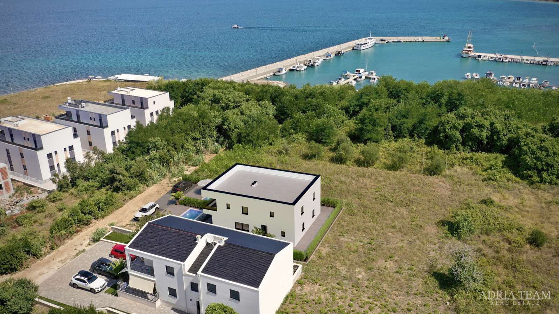 Two halves of a house with a pool, newly built - Privlaka