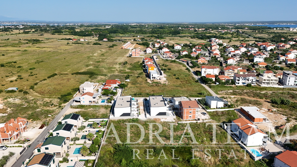 Dvourovňové apartmány v novostavbě ve dvou identických řadových domech - Privlaka