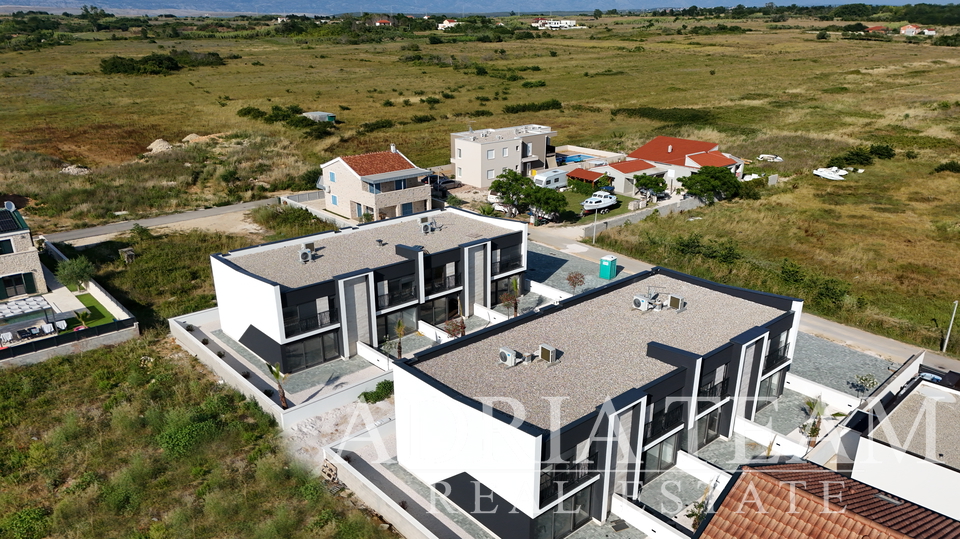 Dvourovňové apartmány v novostavbě ve dvou identických řadových domech - Privlaka