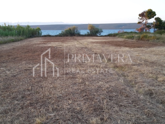 Pašman, Dobropoljana, građevinsko zemljište prvi red do mora, 1850 m2