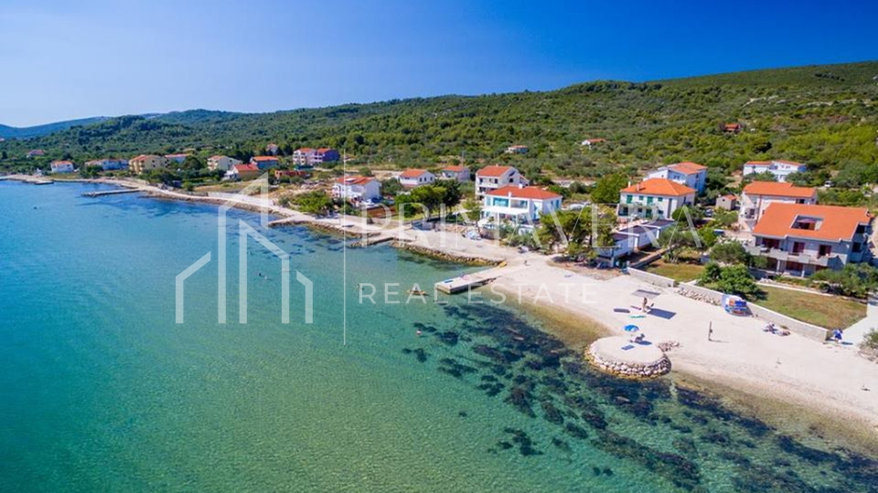 Pašman, Dobropoljana, building land 1st row to the sea, 1850 m2