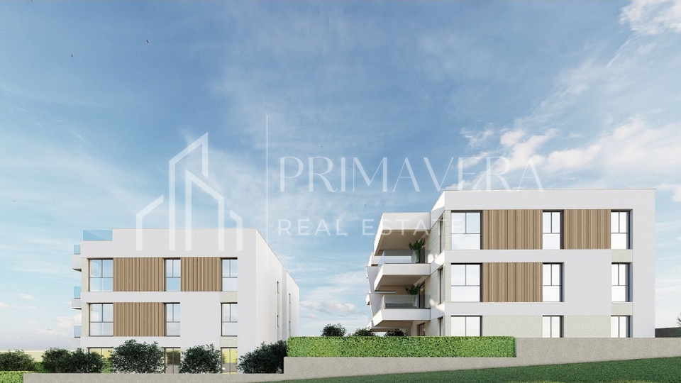 Ra&zcaron;anac&comma; modern two-bedroom apartment S3 in a new building with a view of the sea and Velebit