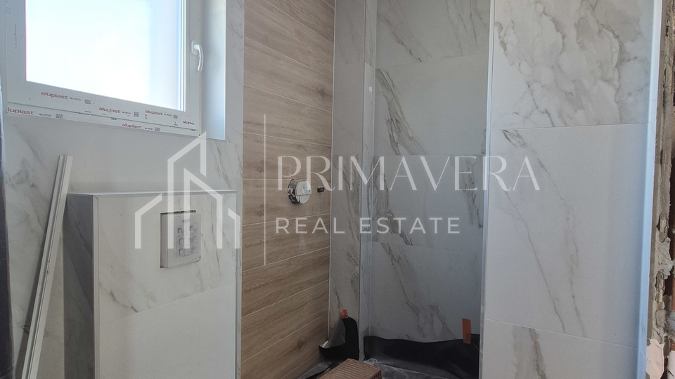 Zadar/Plovanija, new building, a three bedroom apartment, 2nd floor S6, 94,33 m2