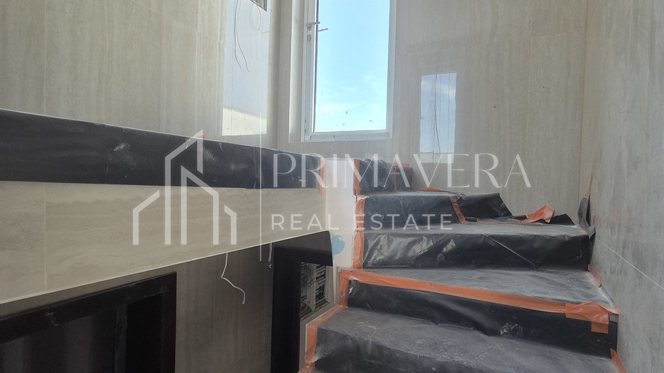 Zadar/Plovanija, new building, a three bedroom apartment, 2nd floor S6, 94,33 m2
