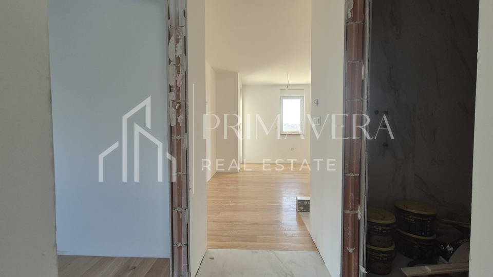 Zadar/Plovanija, new building, a two-bedroom apartment with garden, S2, 95,84 m2