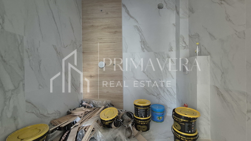 Zadar/Plovanija, new building, a two-bedroom apartment with garden, S2, 95,84 m2