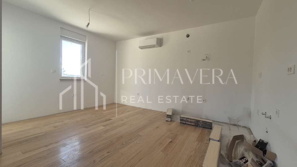 Zadar/Plovanija, new building, a two-bedroom apartment with garden, S2, 95,84 m2