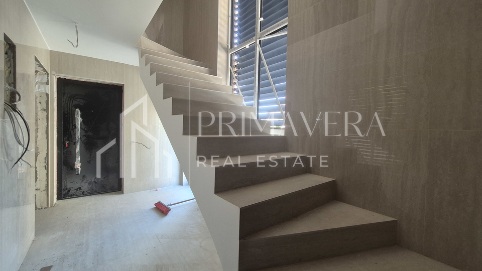 Zadar/Plovanija, new building, a two-bedroom apartment with garden, S2, 95,84 m2