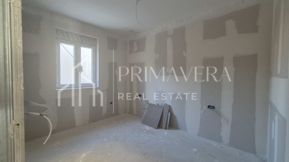 Zadar/Stanovi, excellent city location, a two bedroom apartment with a garden, S1