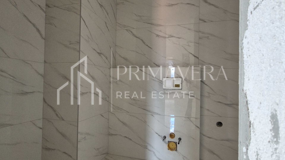 Ra&zcaron;anac&comma; new building&comma; 70m from the sea&comma; apartment S2&comma; garden&comma; sea view