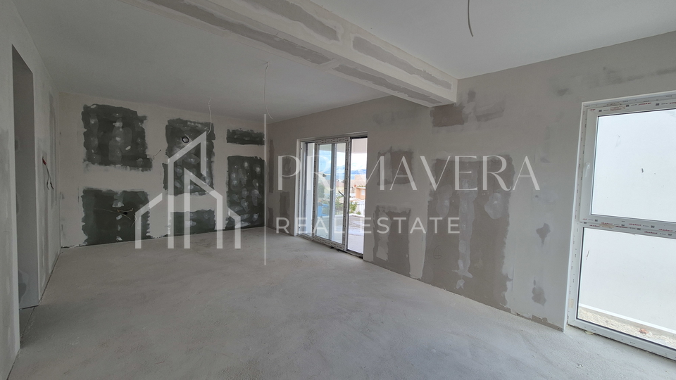 Ra&zcaron;anac&comma; modern two-bedroom apartment S3 in a new building with a view of the sea and Velebit
