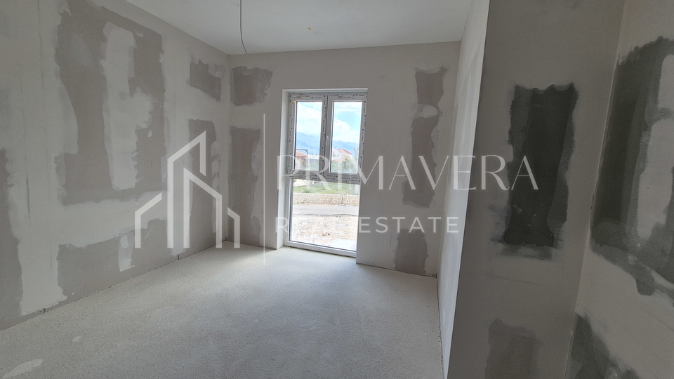 Ra&zcaron;anac&comma; modern two-bedroom apartment S3 in a new building with a view of the sea and Velebit