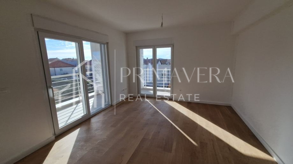Zadar, Plovanija, penthouse with a roof terrace and a sea view, 121,83 m2