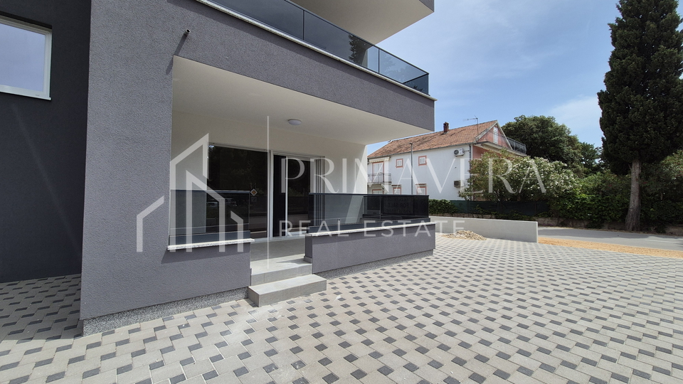 Pakoštane, new building, apartment on the ground floor with a garden, S1