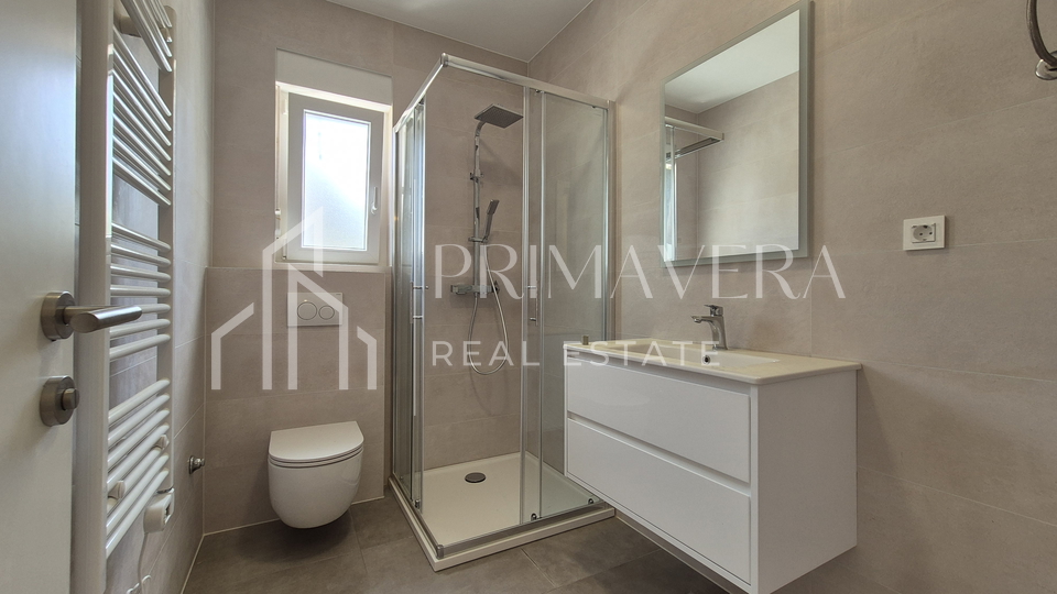 Pakoštane, new building, apartment on the ground floor with a garden, S1