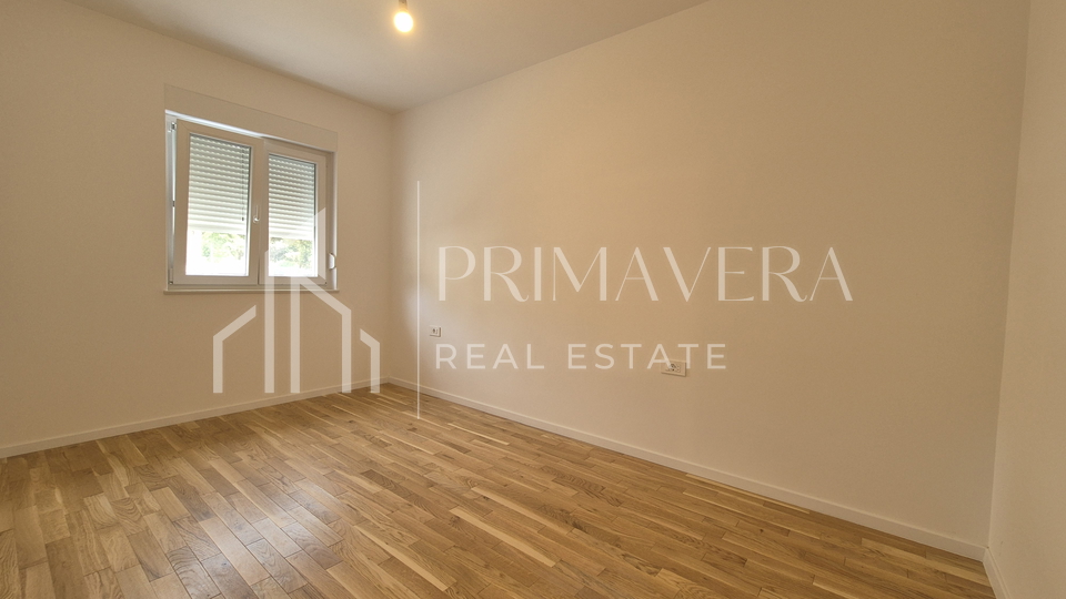 Pakoštane, new building, apartment on the ground floor with a garden, S1