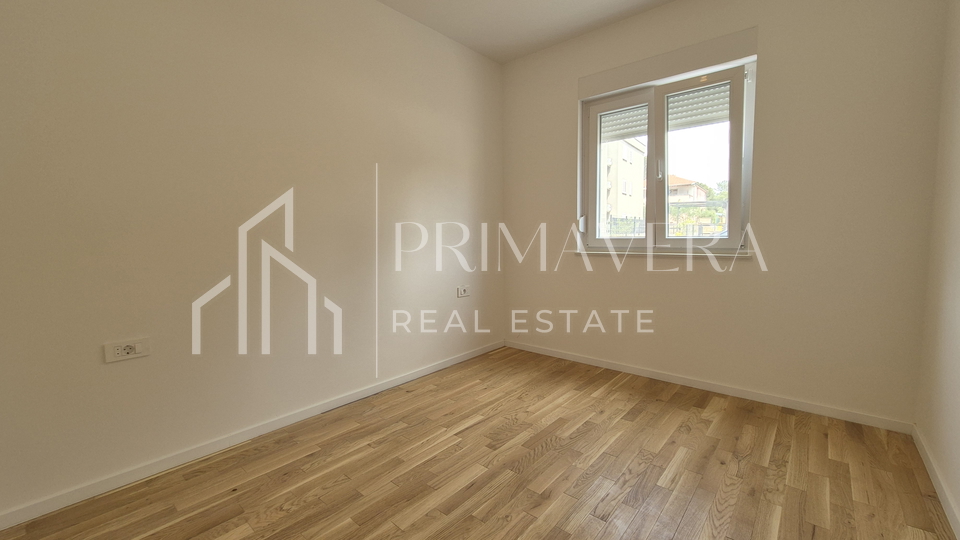 Pakoštane, new building, apartment on the ground floor with a garden, S1