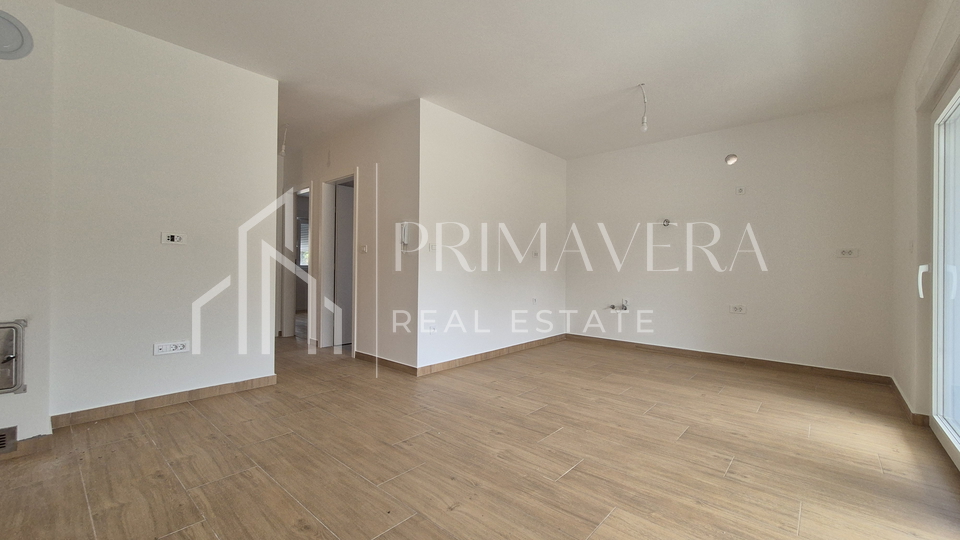 Pakoštane, new building, apartment on the ground floor with a garden, S1