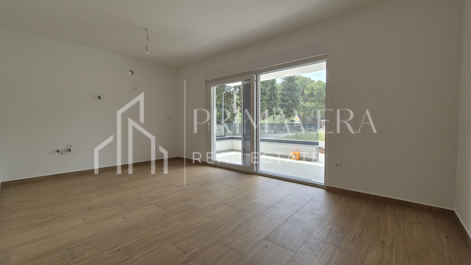 Pakoštane, new building, apartment on the ground floor with a garden, S1