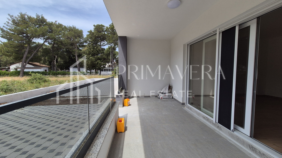 Pakoštane, new building, apartment on the ground floor with a garden, S1