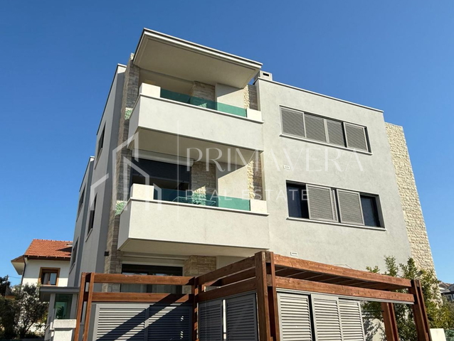 A three bedroom apartment with a garden, Zadar/Mocire, 88,62 m2