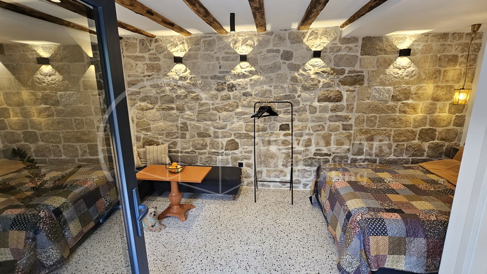 House in a row of tipical Kastela's small street -consist 2 apartments - completely renovated - 50m from the sea