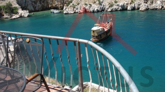 VRBNIK, house on a rock above the sea