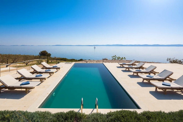 Unique villa in an exclusive location with an area of 47,500 m2, featuring an olive grove and a private mooring! Complete privacy!