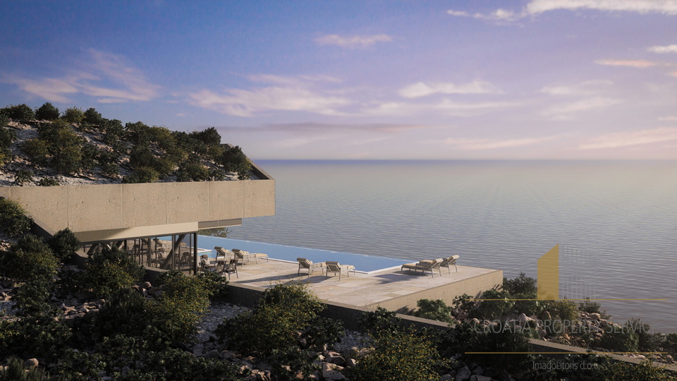 Grande appezzamento di terreno con licenza edilizia, prima fila sul mare nelle vicinanze di Rogoznica.