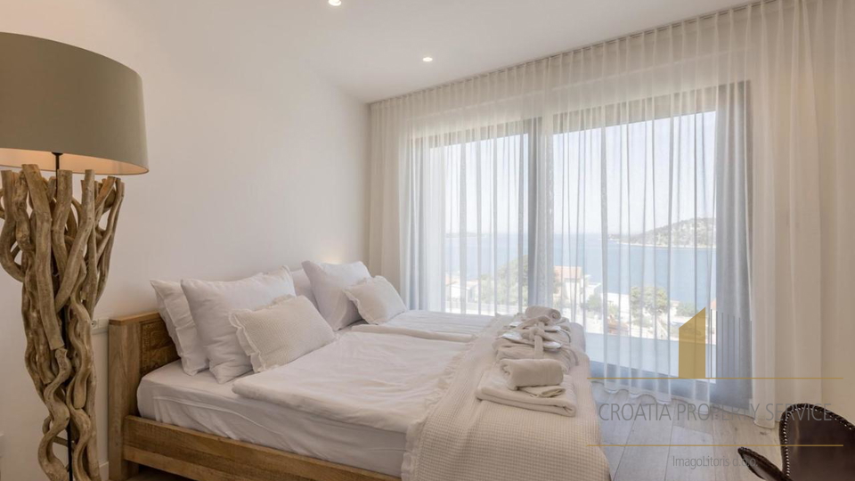 A modern luxury villa with a beautiful view of the sea near Rogoznica!