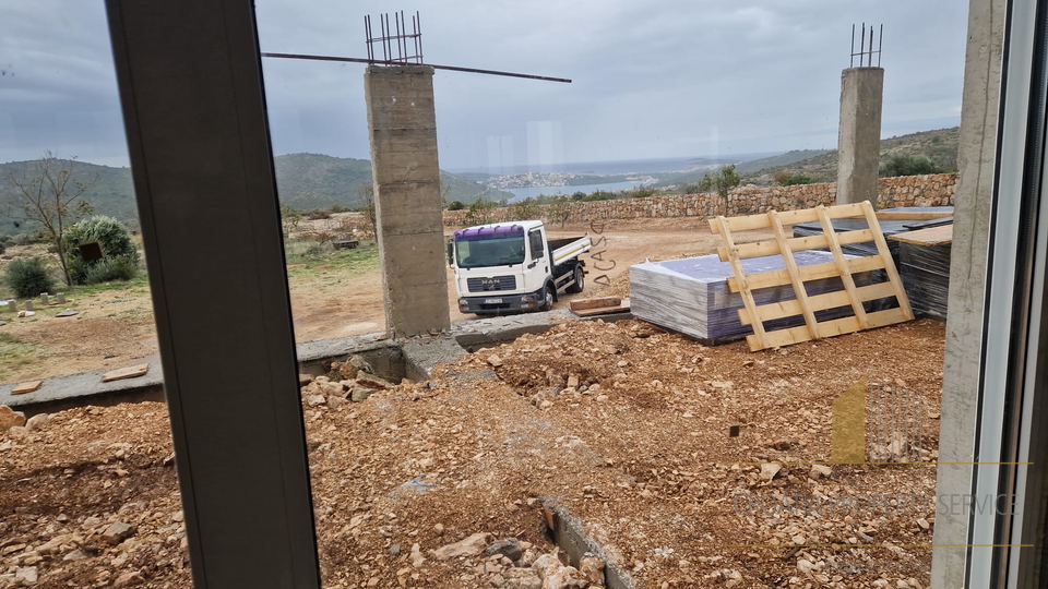 Land with family farm under construction with a panoramic view over Rogoznica!
