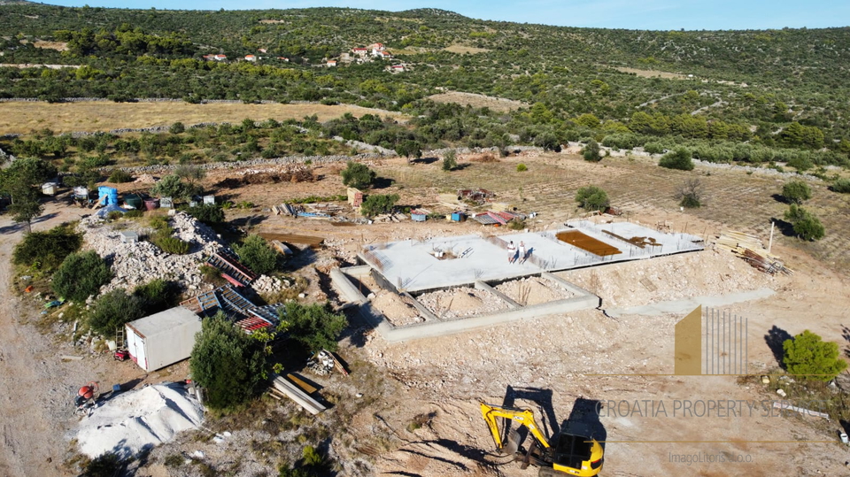 Land with family farm under construction with a panoramic view over Rogoznica!