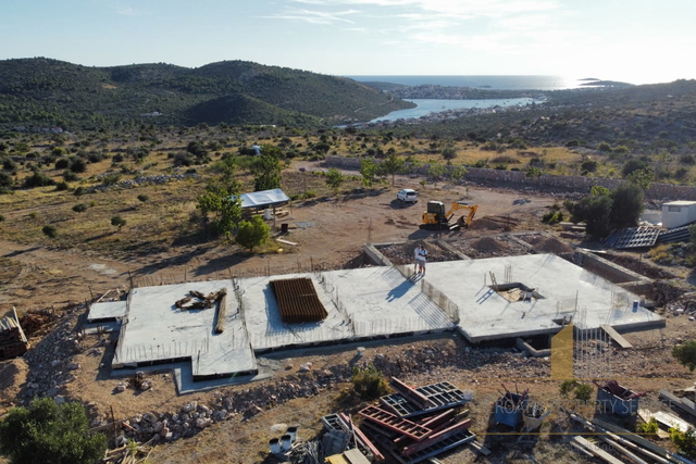 Land with family farm under construction with a panoramic view over Rogoznica!