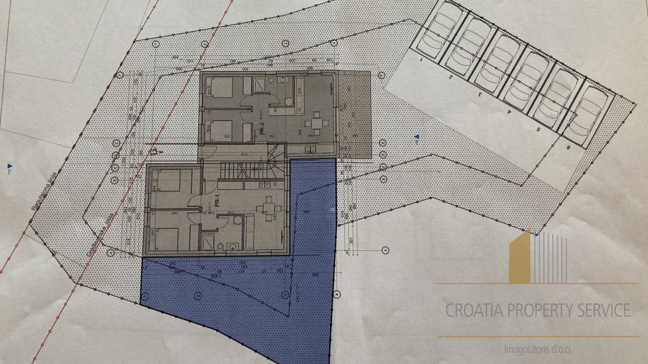 Gradbena parcela v Ražnjah z idejno zasnovo