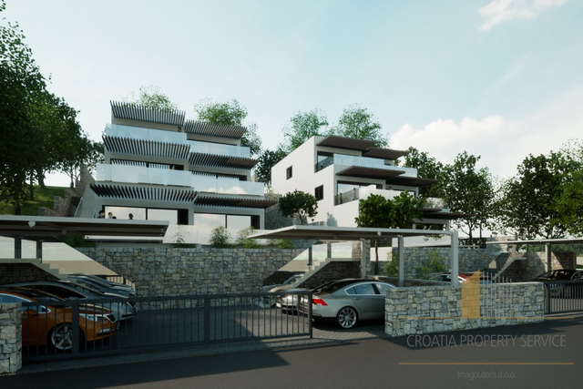 Luxury apartment with a garden in a new building, first row by the beach in the vicinity of Šibenik!