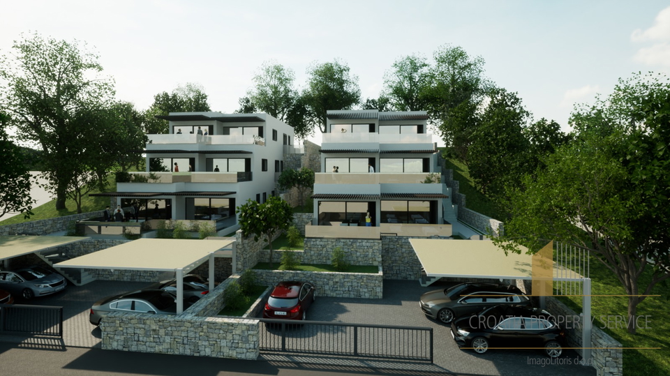 Luxury apartment with a garden in a new building, first row by the beach in the vicinity of Šibenik!
