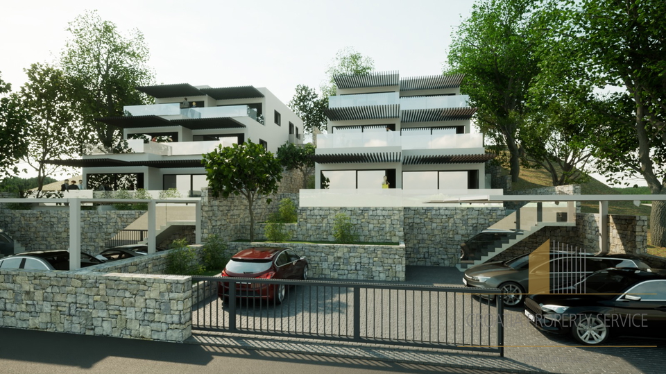 Luxury apartment with a garden in a new building, first row by the beach in the vicinity of Šibenik!