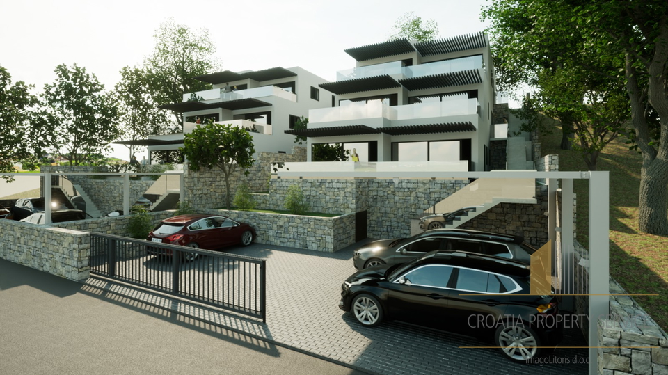 Luxury apartment with a garden in a new building, first row by the beach in the vicinity of Šibenik!