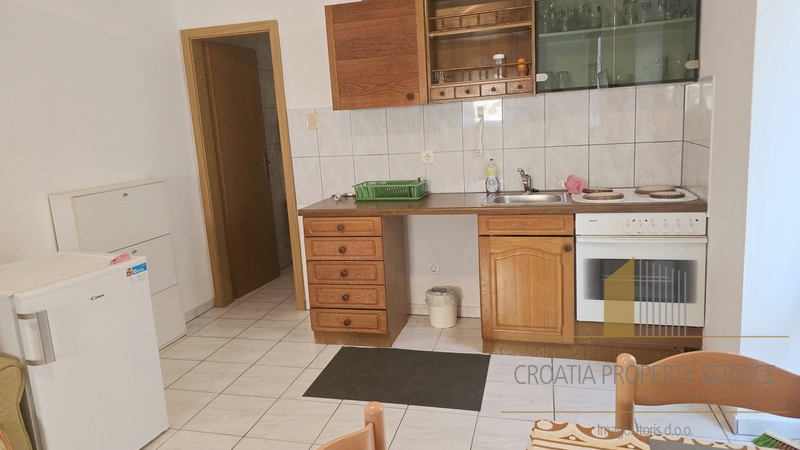 Apartment house with a rooftop terrace in the heart of Makarska - an ideal investment in tourism!