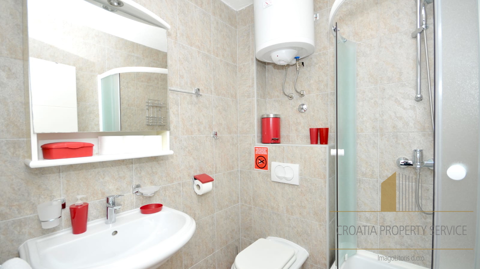 Exclusive sale! A beautiful villa with a pool, first row to the beach in Seget Donji!