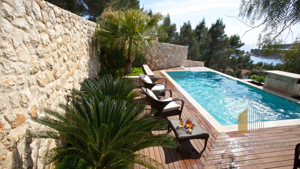 A luxury villa with a pool and a boat dock, first row to the sea on the island of Brač!