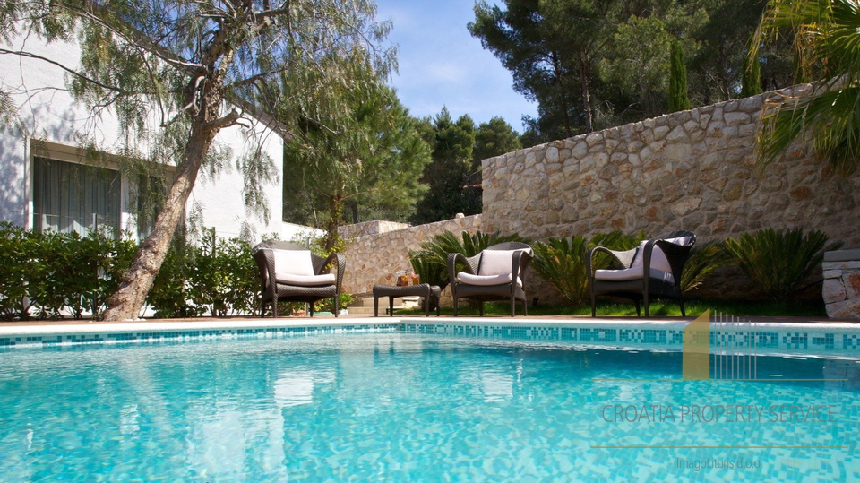 A luxury villa with a pool and a boat dock, first row to the sea on the island of Brač!