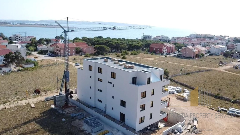 One-bedroom apartment in a modern new building 350 meters from the sea in Povljana, Pag Island!