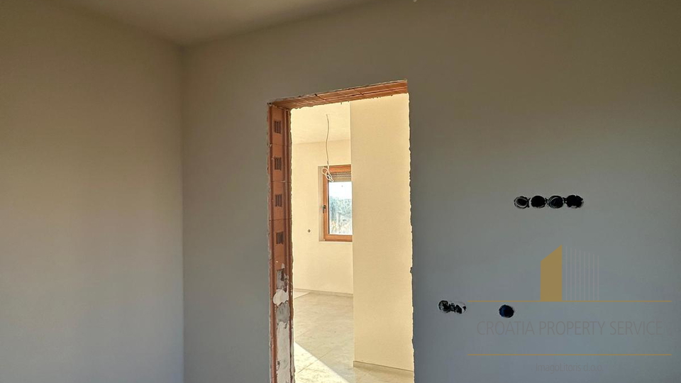 Luxuriöse Wohnung mit Garten und Meerblick in moderner Neubauanlage - Nin!
