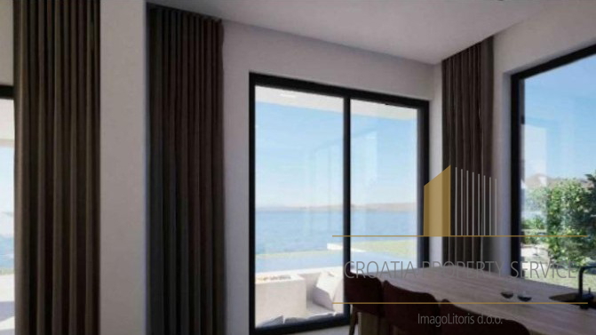 Luxurious penthouse with a rooftop terrace in the first row to the sea – Sukošan!