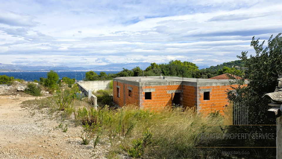 &Scaron;olta&comma; Roga&ccaron; - unfinished building on a 673 m2 plot&comma; permit for a villa with a swimming pool&excl;